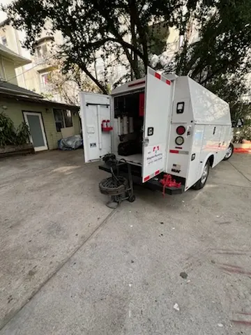 Magnet Plumbing service vehicle on-site for Water Heater Repair in The Groves